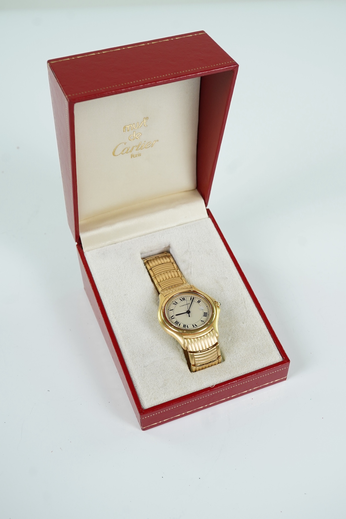 A gentleman's late 20th century 18k gold Cartier Cougar quartz wrist watch